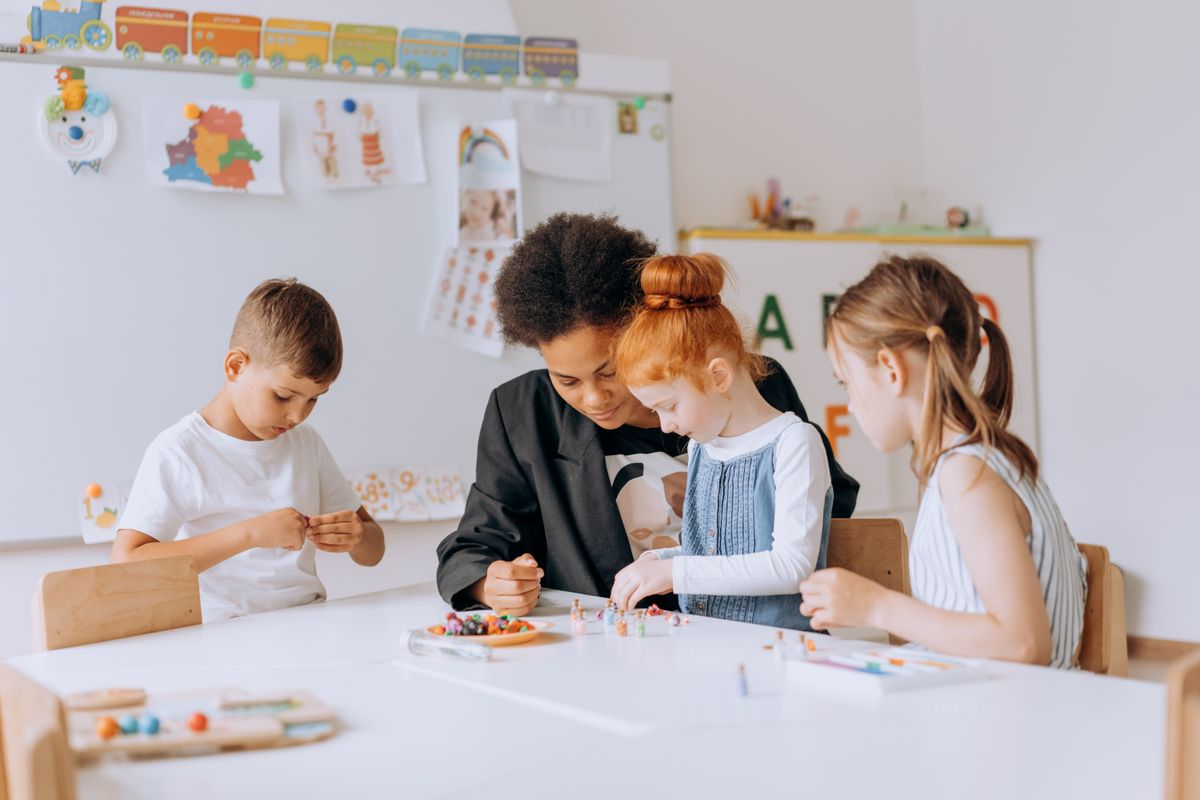 Children and teacher learning together in an inclusive classroom