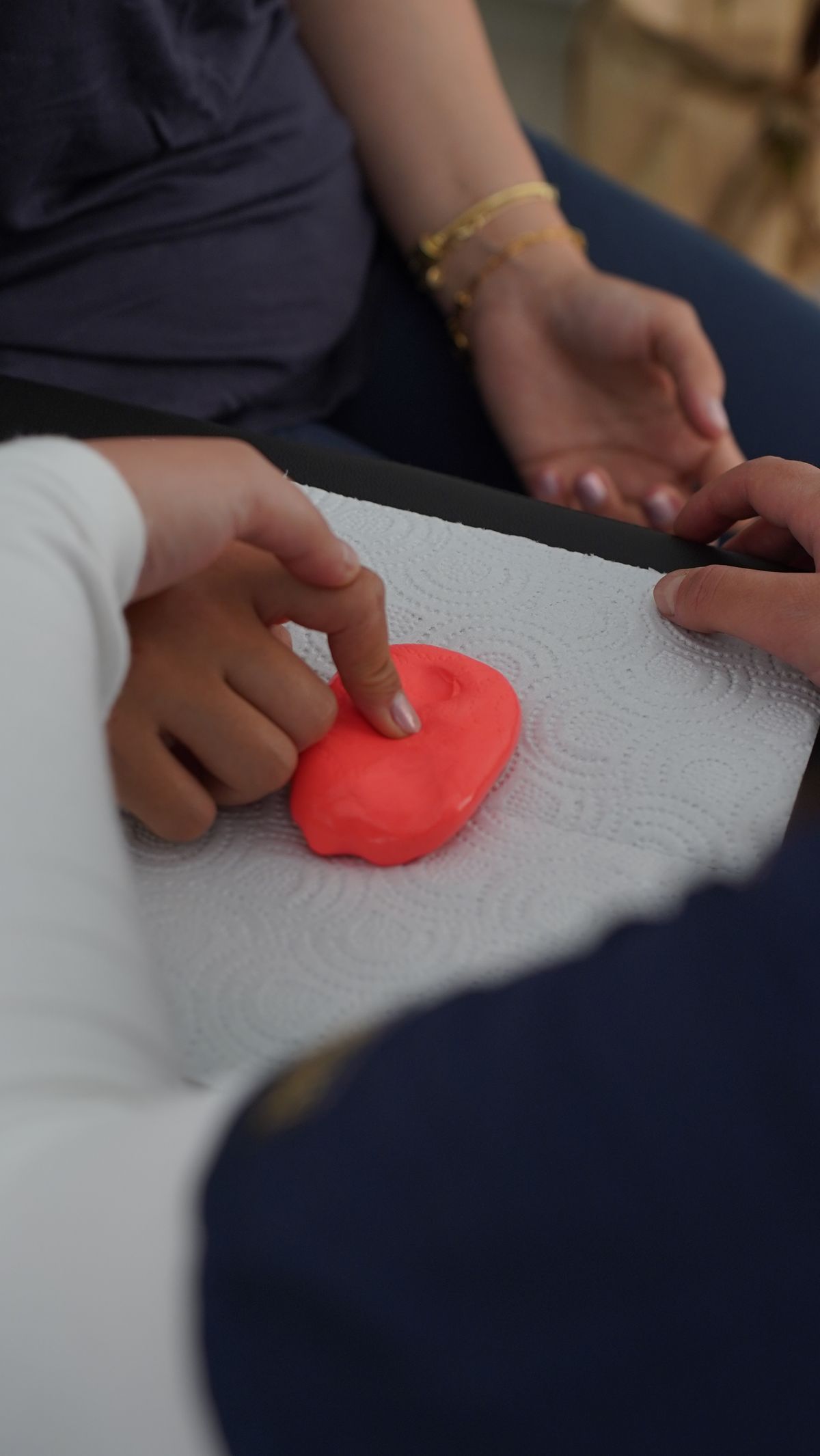 Children exploring tactile materials during sensory play